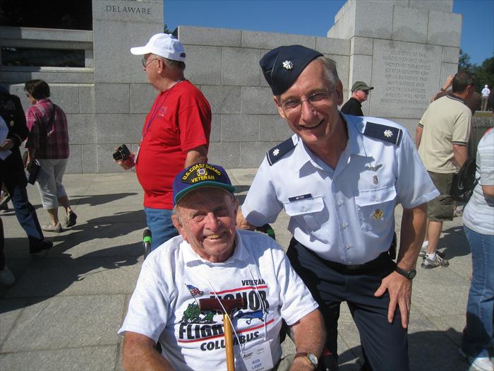 Bob Lamp being thanked by an Air Force serviceman at the WW II Memorial giving Bob an opportunity to be honored and share his story.