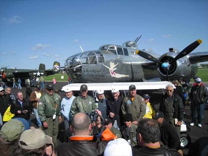 Lt. Col. Richard E. Cole; Major Thomas C. Griffin; Lt. Col. Robert L. Hite, and Master Sgt. David J. Thatcher reunite for their 68th Doolittle Tokyo Raid Reunion at the National Museum of the U.S. Air Force.