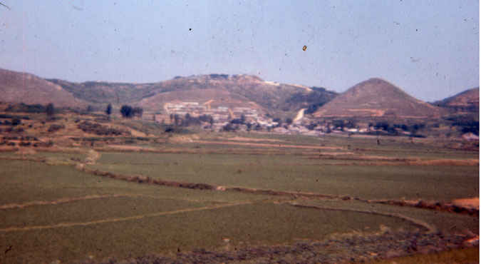 Korea 1973-1974. Rice paddies and thatched roof houses in the farming community near B Battery.