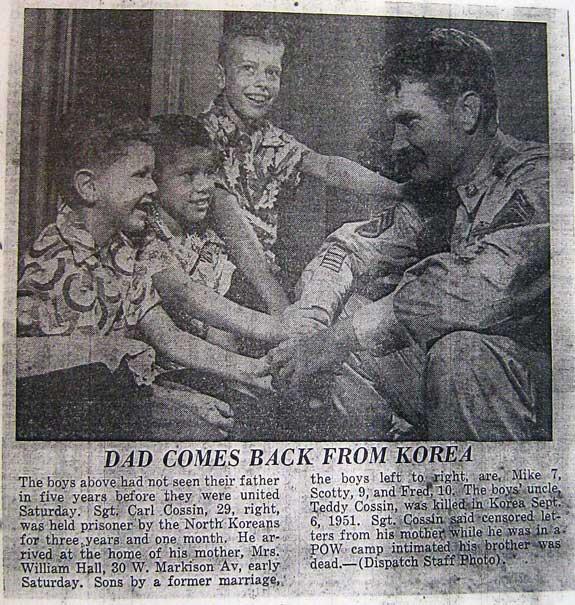 Carl Cossin with this three boys after he was released from North Korea.