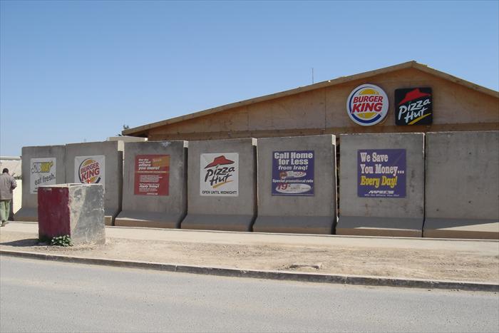 Even in a combat zone, you can't escape it; fast food chains!  Even in Iraq we had the comforts of home, to include some well know fast food joints.  But you couldn't eat this stuff everyday if you worked indoors.  For those of us who worked 10 to 12 hours a day in all our combat gear didn't have this issue.