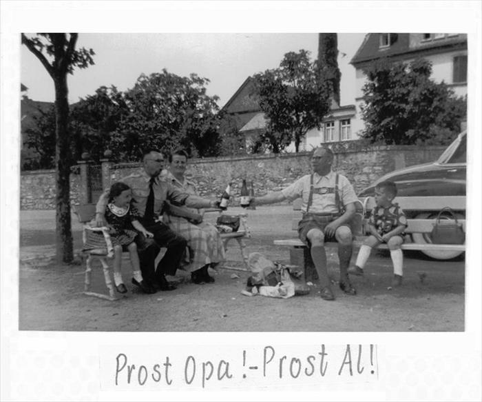 Family outing in Mainz.  My Grandfather doing a German toast (Prost!) with my Great-Grandfather Jakob.