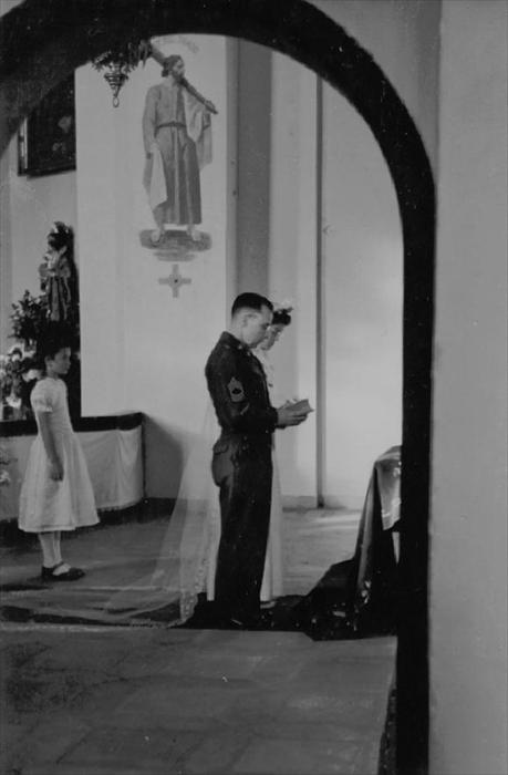 Oma & my Grandfather praying at the altar before the wedding ceremony.  Circa 1948.